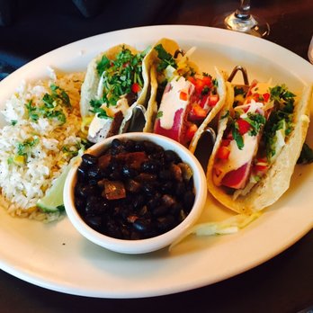 Uncle Julio's - Spicy Seared Tuna Tacos with rice and black beans - Tex-Mex Near Me - Arlington, Virginia Uncle Julio's - Spicy Seared Tuna Tacos with rice and black beans - Tex-Mex Near Me - Arlington, Virginia