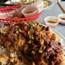 Gas Station Plate piled high with pulled pork, sausage, salt potatoes, coleslaw, and this amazing chili on top. Gas Station Plate piled high with pulled pork, sausage, salt potatoes, coleslaw, and this amazing chili on top.