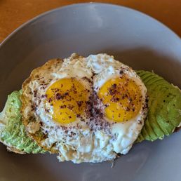 Avocado toast w/ Sunnyside egg Avocado toast w/ Sunnyside egg