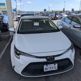 "Intermediate Car" Toyota Corolla. White. I think the model year was 2022, but maybe it's 2021. I don't know. "Intermediate Car" Toyota Corolla. White. I think the model year was 2022, but maybe it's 2021. I don't know.