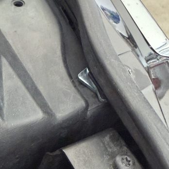 Gabes Collision East - shows the shop using metal spacers to compensate for poorly installed bumper - Body Shops Near Me - East Amherst, New York Gabes Collision East - shows the shop using metal spacers to compensate for poorly installed bumper - Body Shops Near Me - East Amherst, New York
