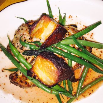 Tupelo Honey - Unbelievable pork chop topped with two pieces of pork belly and green beans! - Southern Near Me - Franklin, Tennessee Tupelo Honey - Unbelievable pork chop topped with two pieces of pork belly and green beans! - Southern Near Me - Franklin, Tennessee