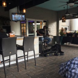 a man sitting at a bar a man sitting at a bar