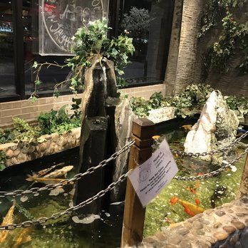 Joy Wok Super Buffet - Fountain with beautiful koi fish. - Chinese Near Me - Kansas City, Missouri