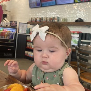 Just Love Cafe - a baby eating a bowl of fruit - Coffee & Tea Near Me - Pembroke, North Carolina Just Love Cafe - a baby eating a bowl of fruit - Coffee & Tea Near Me - Pembroke, North Carolina