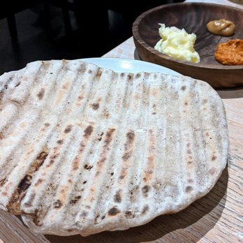 Vicia - Vicia 11/29/19: Calumet Sourdough Flatbread – Fresh Butter, Tomato Tartare, Young Garlic, Tomato Skin Salt - New American Near Me - St. Louis, Missouri Vicia - Vicia 11/29/19: Calumet Sourdough Flatbread – Fresh Butter, Tomato Tartare, Young Garlic, Tomato Skin Salt - New American Near Me - St. Louis, Missouri