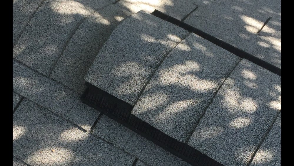 Slide of Alden Roofing