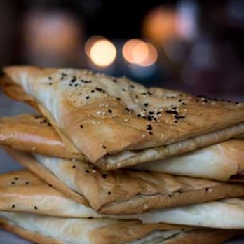 Roni's Kitchen - Burekas- vegan almond-feta, eggplant, mint & za'tar. Served with tahini, housemade pickled veggies, Schug and House Salad or Quinoa Tabouli. - Cooking Classes Near Me Roni's Kitchen - Burekas- vegan almond-feta, eggplant, mint & za'tar. Served with tahini, housemade pickled veggies, Schug and House Salad or Quinoa Tabouli. - Cooking Classes Near Me