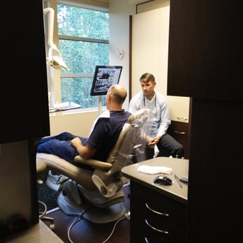 Michael A MacInnes, DDS - Dr. MacInnes chatting with a patient. - General Dentistry Near Me - Sammamish, Washington Michael A MacInnes, DDS - Dr. MacInnes chatting with a patient. - General Dentistry Near Me - Sammamish, Washington