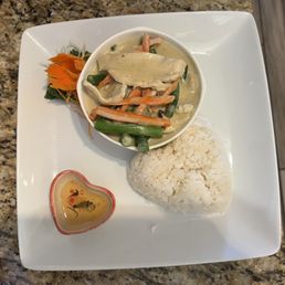 Pad Thai , Green Thai Curry and green chilis and vinegar condiment tray Pad Thai , Green Thai Curry and green chilis and vinegar condiment tray