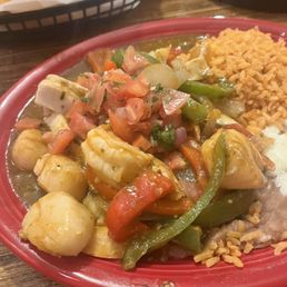 Mariscos A La Diabla (not pictured is the tails left on the shrimp you have to figure out how to take off when the plate and food it HOT) Mariscos A La Diabla (not pictured is the tails left on the shrimp you have to figure out how to take off when the plate and food it HOT)