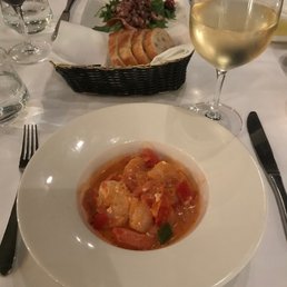 Shrimp Saganaki (close) and Octopus (far) Shrimp Saganaki (close) and Octopus (far)