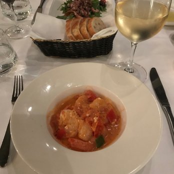 Estiatorio Volos - Shrimp Saganaki (close) and Octopus (far) - Seafood Near Me - Toronto, Ontario Estiatorio Volos - Shrimp Saganaki (close) and Octopus (far) - Seafood Near Me - Toronto, Ontario