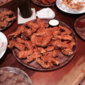 Hooters - Our meal for the day, 50 wings and fries, 3 seperate flavors. - Chicken Wings Near Me - Destin, Florida Hooters - Our meal for the day, 50 wings and fries, 3 seperate flavors. - Chicken Wings Near Me - Destin, Florida