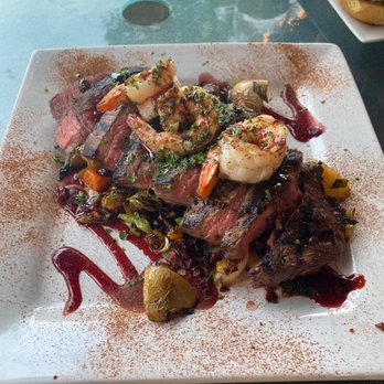 The Twisted Cork - Pomegranate Cinnamon Flank Steak with Shrimp - Wine Bars Near Me - Grants Pass, Oregon