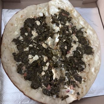 Forno Flatbread - spinach and cheese man'ousheh - Mediterranean Near Me - Katy, Texas Forno Flatbread - spinach and cheese man'ousheh - Mediterranean Near Me - Katy, Texas