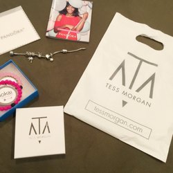 Tess Morgan - Got me some pandora charms and two pink Lokai bracelets