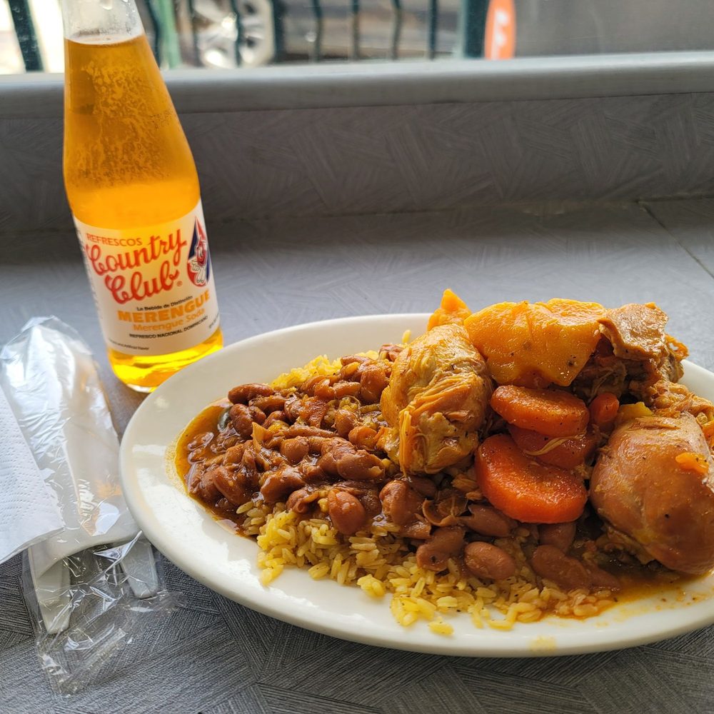 Jennifer's Restaurant - Chicken stew w/ Yellow Rice & Beans. Also Orange Soda branded from the D.R. itself - Dominican Near Me - Jamaica, New York