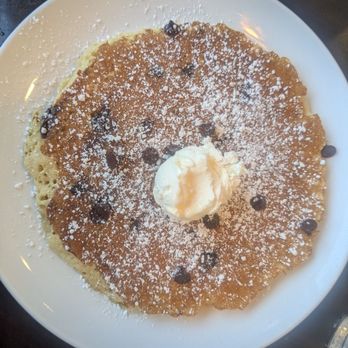 Broken Yolk Cafe - Chocolate chips pancakes single stack (split in 3 and it was a perfect amount between 3 ppl) - Breakfast & Brunch Near Me - Fullerton, California