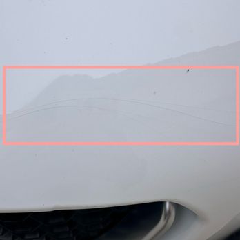 QuikWash - Encino - The paint has cracked under pressure. The bumper flexed during the impact, causing the paint layer to break - Car Wash Near Me - Encino, California QuikWash - Encino - The paint has cracked under pressure. The bumper flexed during the impact, causing the paint layer to break - Car Wash Near Me - Encino, California