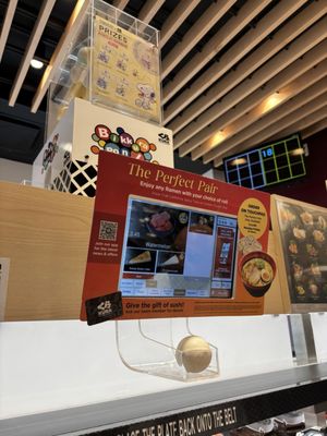 Kura Revolving Sushi Bar by null