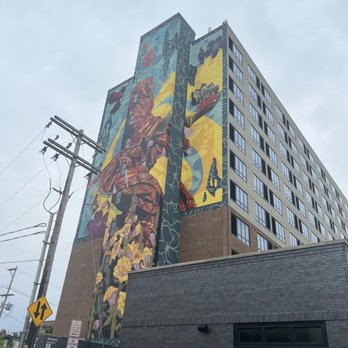 Graduate by Hilton Columbus - Cool A&& mural with a beautiful woman of color on the side of the building. - Hotels Near Me - Columbus, Ohio Graduate by Hilton Columbus - Cool A&& mural with a beautiful woman of color on the side of the building. - Hotels Near Me - Columbus, Ohio