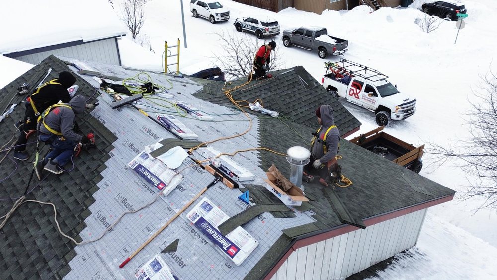 Slide of Reds Roofing & Renovations