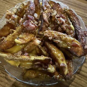 Taps Pub - These loaded potato wedges look nasty and oil is old not eating these! - Sports Bars Near Me - Avilla, Indiana