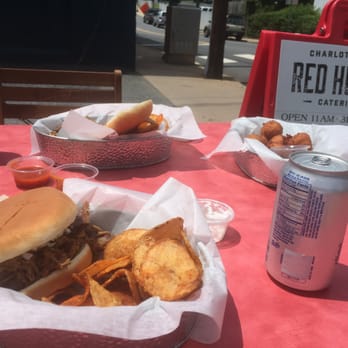 Red Hub Food Co - Pulled Pork sandwich, homemade potato chips, and fresh-made hushpuppies with maple syrup dipping sauce at an outdoor table! - Southern Near Me - Charlottesville, Virginia Red Hub Food Co - Pulled Pork sandwich, homemade potato chips, and fresh-made hushpuppies with maple syrup dipping sauce at an outdoor table! - Southern Near Me - Charlottesville, Virginia