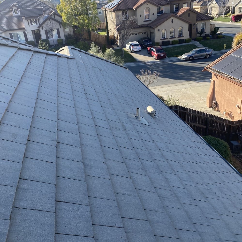 Gilbert The Gutter Guy - South side of roof completely cleaned of moss. This whole roof was green before Gilbert cleaned and treated the roof. - Gutter Services Near Me Gilbert The Gutter Guy - South side of roof completely cleaned of moss. This whole roof was green before Gilbert cleaned and treated the roof. - Gutter Services Near Me