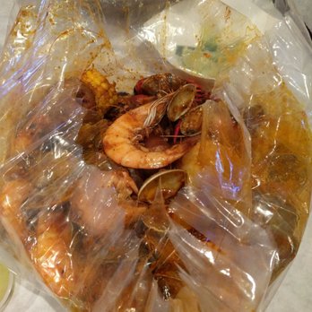 The Crab Shack - Combo 1: 1 pound each of shrimp, clams, and mussels with sausage, potatoes, and corn ($41.99) - Cajun/Creole Near Me - Gardena, California