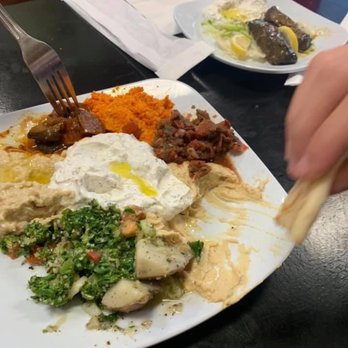 Turkish And Greek Cafe - Small appetizer sampler which we immediately dug into. Dolmas in the background - Turkish Near Me - Baton Rouge, Louisiana Turkish And Greek Cafe - Small appetizer sampler which we immediately dug into. Dolmas in the background - Turkish Near Me - Baton Rouge, Louisiana