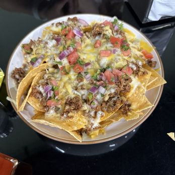 Fuego A La Lata - 8. Beef Nachos Or Chinese - Latin American Near Me - New City, New York Fuego A La Lata - 8. Beef Nachos Or Chinese - Latin American Near Me - New City, New York