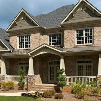 Affordable Construction - Energy efficient, solar reflective almond color vinyl windows with standard grids - Roofing Near Me - Norman, Oklahoma Affordable Construction - Energy efficient, solar reflective almond color vinyl windows with standard grids - Roofing Near Me - Norman, Oklahoma