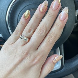Hard gel mani with chrome and gold accents.