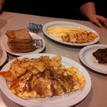 Latham '76 Diner - The wife's flat iron steak and eggs. My combination omelette and wheat toast. Smells amazing. - Diners Near Me - Latham, New York Latham '76 Diner - The wife's flat iron steak and eggs. My combination omelette and wheat toast. Smells amazing. - Diners Near Me - Latham, New York