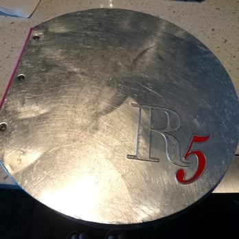 R5 - a closeup of a metal plate with the number 5 on it - Lounges Near Me - Niagara Falls, Ontario