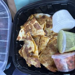 Chicken Quesadilla it comes with Guacamole, Salsa , and Sour Cream . Chicken Quesadilla it comes with Guacamole, Salsa , and Sour Cream .