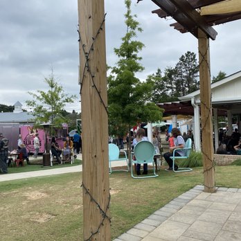Red's Corner - Bar and sitting area with food trucks in background - Beer Gardens Near Me - Southern Pines, North Carolina Red's Corner - Bar and sitting area with food trucks in background - Beer Gardens Near Me - Southern Pines, North Carolina