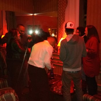 The Red Lounge - a group of people in a living room - Hookah Bars Near Me - Binghamton, New York The Red Lounge - a group of people in a living room - Hookah Bars Near Me - Binghamton, New York