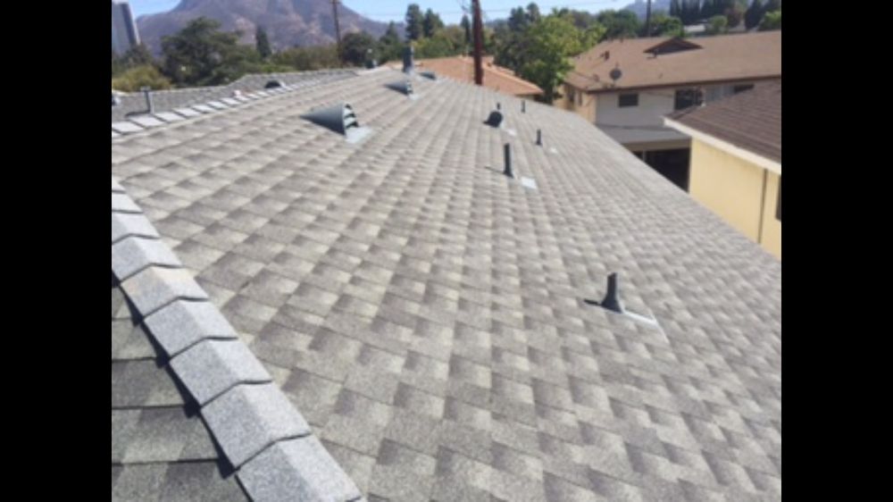 Slide of Ruiz Roofing Construction