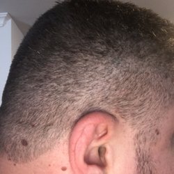 Holiday Hair - This apparently is a zero. Zero means no guard (skin), at least for the 18 years I've been getting this type of haircut.