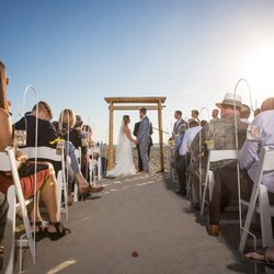 Alfredo's Beach Club - Shot of the ceremony, with the ocean in the background.