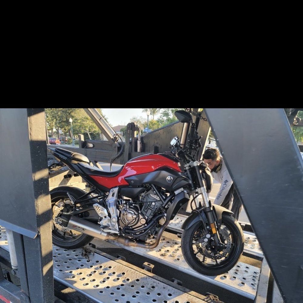 Auto Express - Bike getting loaded in San Diego - Vehicle Shipping Near Me - San Diego, California
