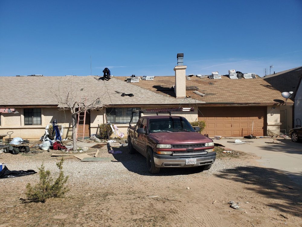 Slide of Do It All Roofing