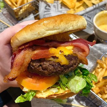 Teddy Jack's Hub City Grill - Cowboy Burger with a tiny onion ring and no A1 sauce - American Near Me - Lubbock, Texas