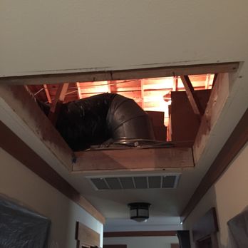 Hole In the Wall - Old whole house fan is removed leaving a 36"x36" hole. - Drywall Installation & Repair Near Me Hole In the Wall - Old whole house fan is removed leaving a 36"x36" hole. - Drywall Installation & Repair Near Me