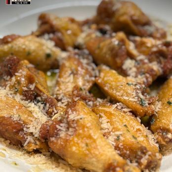 Abe's Place Tap & Grill - Garlic Parm Wings at Abe's Place--crispy, cheesy, and packed with flavor. - Chicken Wings Near Me - Clearwater, Florida Abe's Place Tap & Grill - Garlic Parm Wings at Abe's Place--crispy, cheesy, and packed with flavor. - Chicken Wings Near Me - Clearwater, Florida