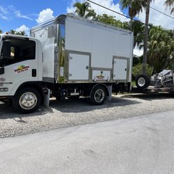Haskins Plumbing - The isuzu pulling the MT-52 to the next job site