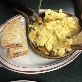 Egg Works - Bacon ham and sausage skillet with sour dough bread - Breakfast & Brunch Near Me - Las Vegas, Nevada Egg Works - Bacon ham and sausage skillet with sour dough bread - Breakfast & Brunch Near Me - Las Vegas, Nevada